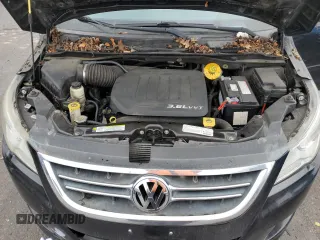 2014 Volkswagen Routan SE with VIN 2C4RVABG5ER135304, listed as a Copart auction lot 83957644 with 118,035 mi miles and Clean title. Bid and sale history available at DreamBid. Image 12.