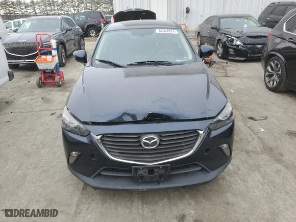 2016 Mazda CX-3 Touring with VIN JM1DKFC70G0136632, listed as a Copart auction lot 82004974 with 87,249 mi miles and Salvage Title. Bid and sale history available at carsss.com. Image 5.