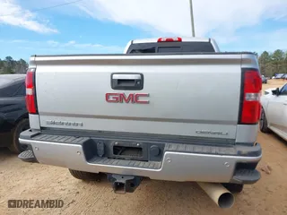 2017 GMC Sierra 2500HD Denali with VIN 1GT12UEY8HF216479, listed as a IAAI auction lot 41678315 with 127,057 mi miles. Bid and sale history available at carsss.com. Image 16.