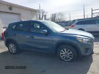 2016 Mazda CX-5 Sport with VIN JM3KE4BY0G0746034, listed as a IAAI auction lot 41842894 with 92,801 mi miles. Bid and sale history available at carsss.com. Image 13.