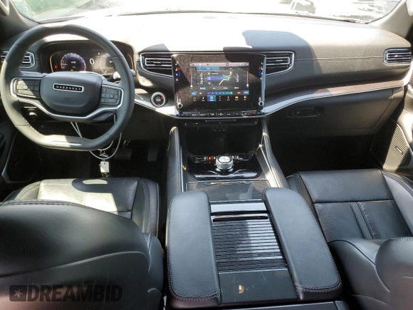 2022 Jeep Grand Wagoneer с VIN 1C4SJUAT9NS202210, выставлен на аукционе Copart как лот 57844125 с пробегом 75 047 миль миль и Списание • Salvage title. История ставок и продаж доступна на DreamBid. Изображение 8.