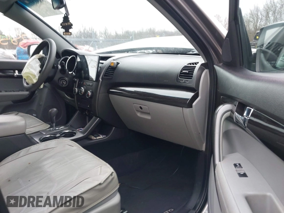 2013 Kia Sorento LX with VIN 5XYKT3A62DG349522, listed as a IAAI auction lot 38563127 with 127,205 mi miles and . Bid and sale history available at carsss.com. Image 5.