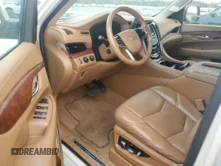 2015 Cadillac Escalade Platinum z VIN 1GYS4PKJ5FR574930, wystawiony jako Copart lot #74691204 z przebiegiem Nie podano mil oraz Szkoda całkowita • Salvage title. Historia ofert i sprzedaży dostępna na DreamBid. Obrazek 8.