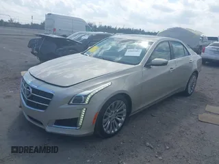 2014 Cadillac CTS Luxury RWD with VIN 1G6AR5SX1E0158438, listed as a IAAI auction lot 41801082 with 28,888 mi miles. Bid and sale history available at carsss.com. Image 2.