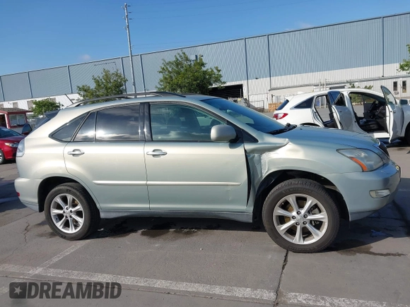 2008 Lexus RX with VIN 2T2HK31U68C090638, listed as a IAAI auction lot 42136578 with 97,610 mi miles. Bid and sale history available at carsss.com. Image 13.