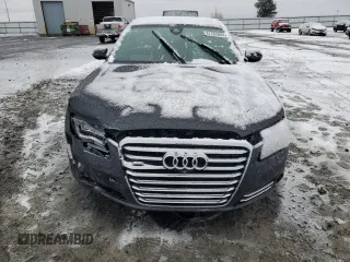 2014 Audi A8 L 3.0T with VIN WAURGAFD1EN002981, listed as a Copart auction lot 87282884 with 106,763 mi miles and Salvage Title. Bid and sale history available at carsss.com. Image 5.