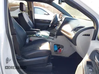 2019 Dodge Grand Caravan SXT with VIN 2C4RDGCG2KR775177, listed as a IAAI auction lot 41363146 with 129,739 mi miles and . Bid and sale history available at DreamBid. Image 5.
