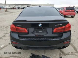 2018 BMW 5 Series M550i xDrive with VIN WBAJB9C56JB049524, listed as a Copart auction lot 43511805 with 55,759 mi miles and Salvage title. Bid and sale history available at DreamBid. Image 6.