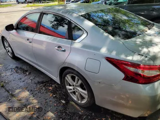 2016 Nissan Altima SL with VIN 1N4BL3AP8GC158954, listed as a IAAI auction lot 42718057 with 185,205 mi miles and . Bid and sale history available at DreamBid. Image 3.