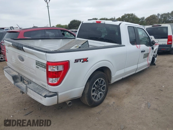 2023 Ford F-150 XL with VIN 1FTEX1CP9PKD57496, listed as a IAAI auction lot 40744859 with 56,487 mi miles and . Bid and sale history available at DreamBid. Image 4.