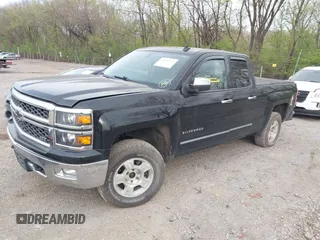 2014 Chevrolet Silverado 1500 LTZ with VIN 1GCVKSEC0EZ390082, listed as a IAAI auction lot 42030144 with 161,353 mi miles and . Bid and sale history available at DreamBid. Image 17.