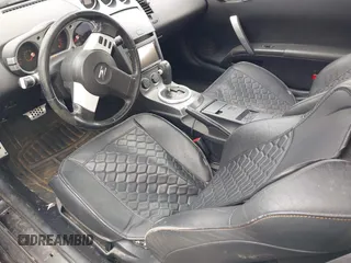 2003 Nissan 350Z Performance z VIN JN1AZ34D73T115371, wystawiony jako IAAI lot #42183650 z przebiegiem 113 331 mil mil oraz . Historia ofert i sprzedaży dostępna na DreamBid. Obrazek 5.