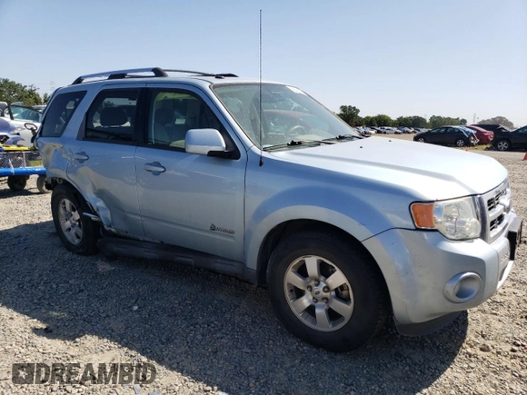 2009 Ford Escape Hybrid z VIN 1FMCU49309KA30344, wystawiony jako Copart lot #55644835 z przebiegiem 112 641 mil mil oraz Szkoda całkowita • Salvage title. Historia ofert i sprzedaży dostępna na DreamBid. Obrazek 4.