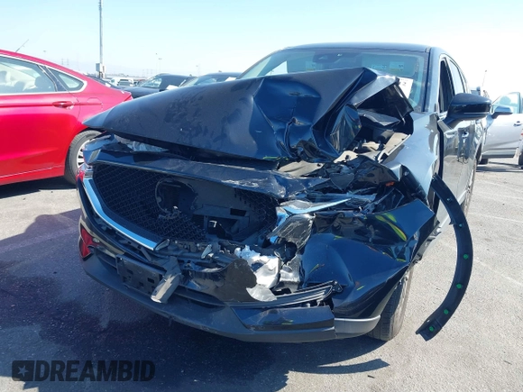 2017 Mazda CX-5 Touring with VIN JM3KFACL2H0146213, listed as a IAAI auction lot 41626112 with 77,829 mi miles and . Bid and sale history available at carsss.com. Image 2.