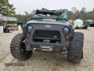 2012 Jeep Wrangler Unlimited Rubicon with VIN 1C4HJWFG7CL205244, listed as a Copart auction lot 86651914 with Not provided miles and Salvage title. Bid and sale history available at DreamBid. Image 5.