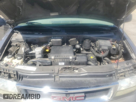 2003 GMC Safari z VIN 1GKDM19XX3B514754, wystawiony jako Copart lot #50744805 z przebiegiem 142 216 mil mil oraz Szkoda całkowita • Salvage title. Historia ofert i sprzedaży dostępna na DreamBid. Obrazek 12.