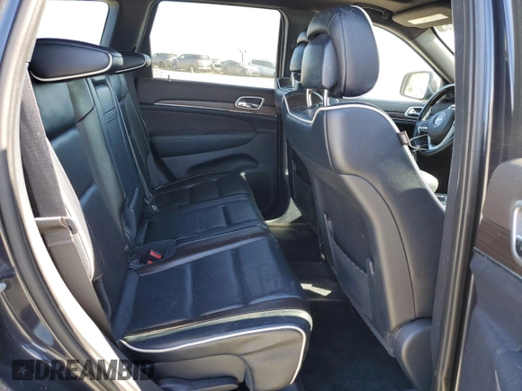 2015 Jeep Grand Cherokee Overland with VIN 1C4RJFCM3FC887817, listed as a Copart auction lot 57420185 with 145,971 mi miles and Clean title. Bid and sale history available at DreamBid. Image 11.