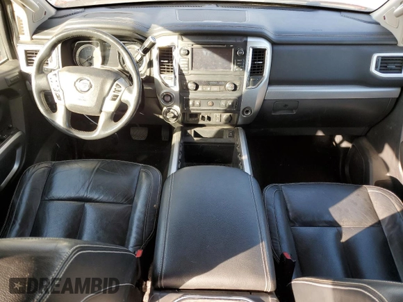 2016 Nissan Titan XD PRO-4X with VIN 1N6BA1F43GN512559, listed as a Copart auction lot 82991154 with 0 mi miles and Salvage Title. Bid and sale history available at carsss.com. Image 8.