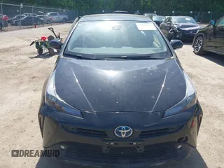 2022 Toyota Prius L Eco with VIN JTDKAMFU0N3175619, listed as a IAAI auction lot 42098135 with 72,984 mi miles and . Bid and sale history available at DreamBid. Image 12.
