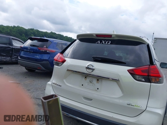 2017 Nissan Rogue SV with VIN 5N1AT2MV5HC812557, listed as a IAAI auction lot 42677622 with 64,686 mi miles and . Bid and sale history available at DreamBid. Image 16.