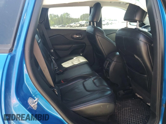 2019 Jeep Cherokee Trailhawk Elite z VIN 1C4PJMBXXKD309306, wystawiony jako Copart lot #53428305 z przebiegiem 99 448 mil mil oraz Szkoda całkowita • Salvage title. Historia ofert i sprzedaży dostępna na DreamBid. Obrazek 12.