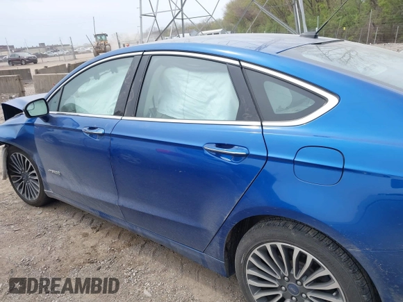 2017 Ford Fusion Hybrid Titanium с VIN 3FA6P0RU5HR388615, выставлен на аукционе IAAI как лот 42066142 с пробегом 121 618 миль миль и . История ставок и продаж доступна на DreamBid. Изображение 14.