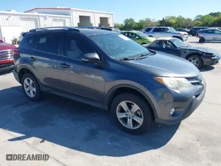 2014 Toyota RAV4 XLE with VIN JTMWFREV3ED038985, listed as a IAAI auction lot 41760577 with 68,814 mi miles. Bid and sale history available at carsss.com. Image 1.