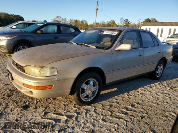 1992 Toyota Camry LE with VIN 4T1SK12E1NU127255, listed as a Copart auction lot 75554584 with 385,507 mi miles and Salvage Title. Bid and sale history available at carsss.com. Image 1.