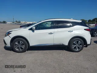 2020 Nissan Murano SV z VIN 5N1AZ2BJ3LN166270, wystawiony jako IAAI lot #41479089 z przebiegiem 28 427 mil mil oraz . Historia ofert i sprzedaży dostępna na DreamBid. Obrazek 14.
