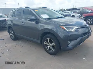 2018 Toyota RAV4 XLE with VIN JTMWFREV9JJ165705, listed as a IAAI auction lot 42527389 with 234,693 mi miles and . Bid and sale history available at DreamBid. Image 1.