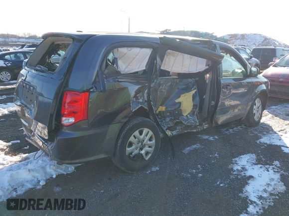 2016 Dodge Grand Caravan SE with VIN 2C4RDGBG1GR211030, listed as a IAAI auction lot 41386099 with 73,244 mi miles and . Bid and sale history available at DreamBid. Image 4.