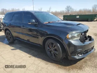 2012 Dodge Durango R/T with VIN 1C4SDHCT7CC321652, listed as a Copart auction lot 51764035 with 173,287 mi miles and Salvage title. Bid and sale history available at DreamBid. Image 4.