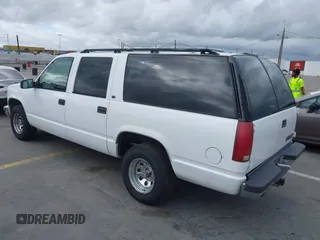 1999 Chevrolet Suburban with VIN 3GNEC16R2XG247140, listed as a IAAI auction lot 41761237 with 202,121 mi miles. Bid and sale history available at carsss.com. Image 3.