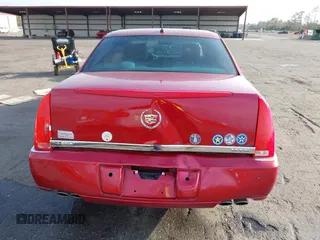 2008 Cadillac DTS 1SA z VIN 1G6KD57Y68U165791, wystawiony jako IAAI lot #41579605 z przebiegiem 94 451 mil mil oraz . Historia ofert i sprzedaży dostępna na DreamBid. Obrazek 16.