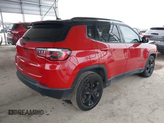 2020 Jeep Compass Latitude with VIN 3C4NJCBBXLT147596, listed as a IAAI auction lot 41382747 with 50,572 mi miles and . Bid and sale history available at DreamBid. Image 4.
