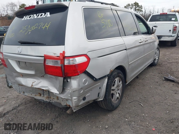 2005 Honda Odyssey EX with VIN 5FNRL38435B071998, listed as a IAAI auction lot 41808601 with 999,999 mi miles. Bid and sale history available at carsss.com. Image 4.