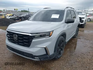 2024 Honda Pilot Touring z VIN 5FNYG1H71RB005034, wystawiony jako IAAI lot #42371878 z przebiegiem Nie podano mil oraz . Historia ofert i sprzedaży dostępna na DreamBid. Obrazek 6.