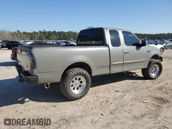 1999 Ford F-150 with VIN 1FTRX17W1XNC25527, listed as a Copart auction lot 48662525 with 150,544 mi miles and Salvage Title. Bid and sale history available at DreamBid. Image 3.