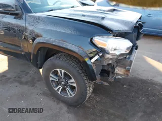 2016 Toyota Tacoma SR with VIN 3TMCZ5AN0GM023263, listed as a IAAI auction lot 41302069 with 137,276 mi miles and . Bid and sale history available at DreamBid. Image 19.