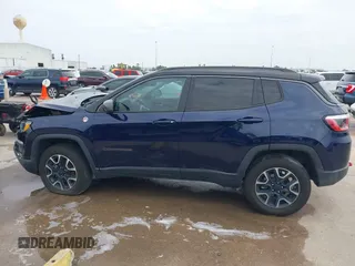 2019 Jeep Compass Trailhawk with VIN 3C4NJDDB8KT619330, listed as a IAAI auction lot 41237920 with 85,144 mi miles and . Bid and sale history available at DreamBid. Image 14.