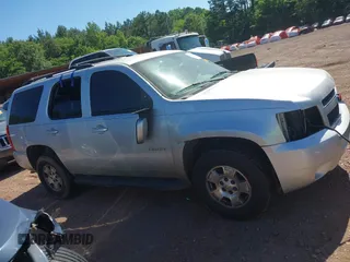 2014 Chevrolet Tahoe LT with VIN 1GNSCBE00ER147899, listed as a IAAI auction lot 42322761 with 299,342 mi miles and . Bid and sale history available at DreamBid. Image 13.