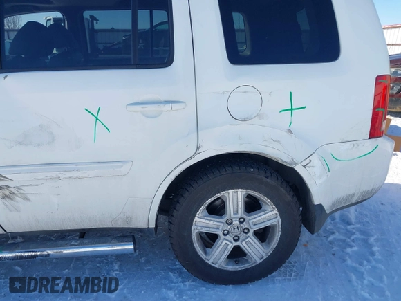 2013 Honda Pilot EX-L with VIN 5FNYF4H79DB086426, listed as a IAAI auction lot 41572456 with 190,745 mi miles and . Bid and sale history available at DreamBid. Image 17.