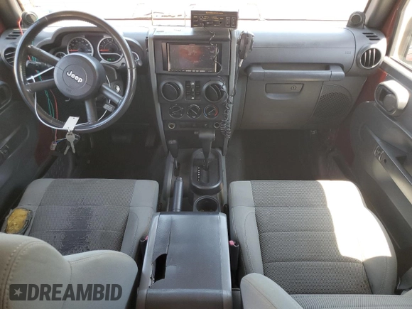 2007 Jeep Wrangler Unlimited Sahara with VIN 1J4GA59187L186314, listed as a Copart auction lot 55437405 with 228,177 mi miles and Clean title. Bid and sale history available at DreamBid. Image 8.