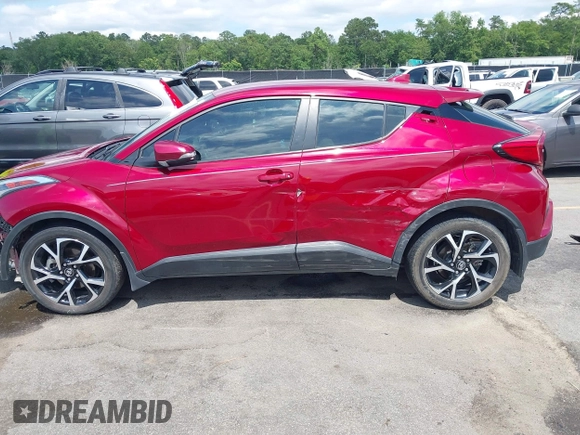 2018 Toyota C-HR XLE with VIN NMTKHMBX5JR013469, listed as a IAAI auction lot 42356609 with 32,051 mi miles and . Bid and sale history available at DreamBid. Image 15.