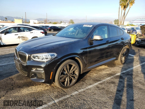 2020 BMW X4 M40i with VIN 5UX2V5C0XL9B53828, listed as a Copart auction lot 43190795 with 55,374 mi miles and Salvage title. Bid and sale history available at DreamBid. Image 1.
