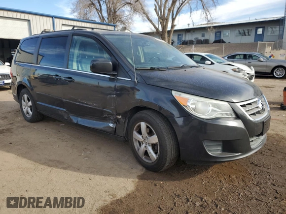 2011 Volkswagen Routan SE with VIN 2V4RW3DGXBR642528, listed as a Copart auction lot 45082055 with 167,067 mi miles and Salvage title. Bid and sale history available at DreamBid. Image 4.