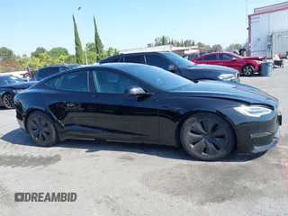 2022 Tesla Model S with VIN 5YJSA1E5XNF467435, listed as a IAAI auction lot 42538706 with 26,504 mi miles and . Bid and sale history available at DreamBid. Image 13.