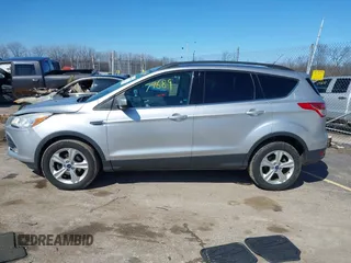 2014 Ford Escape SE with VIN 1FMCU0GX6EUE34729, listed as a IAAI auction lot 41879689 with 167,600 mi miles and . Bid and sale history available at DreamBid. Image 14.
