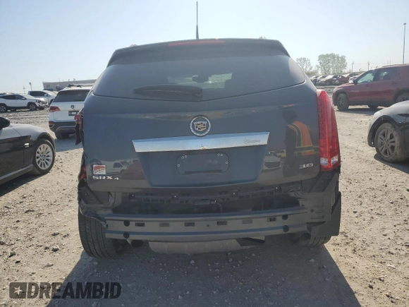 2013 Cadillac SRX Premium Collection with VIN 3GYFNJE37DS531306, listed as a Copart auction lot 52613645 with 20,594 mi miles and Salvage title. Bid and sale history available at DreamBid. Image 6.