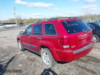 2006 Jeep Grand Cherokee Laredo with VIN 1J4GR48KX6C128491, listed as a IAAI auction lot 41949301 with 183,791 mi miles. Bid and sale history available at carsss.com. Image 3.